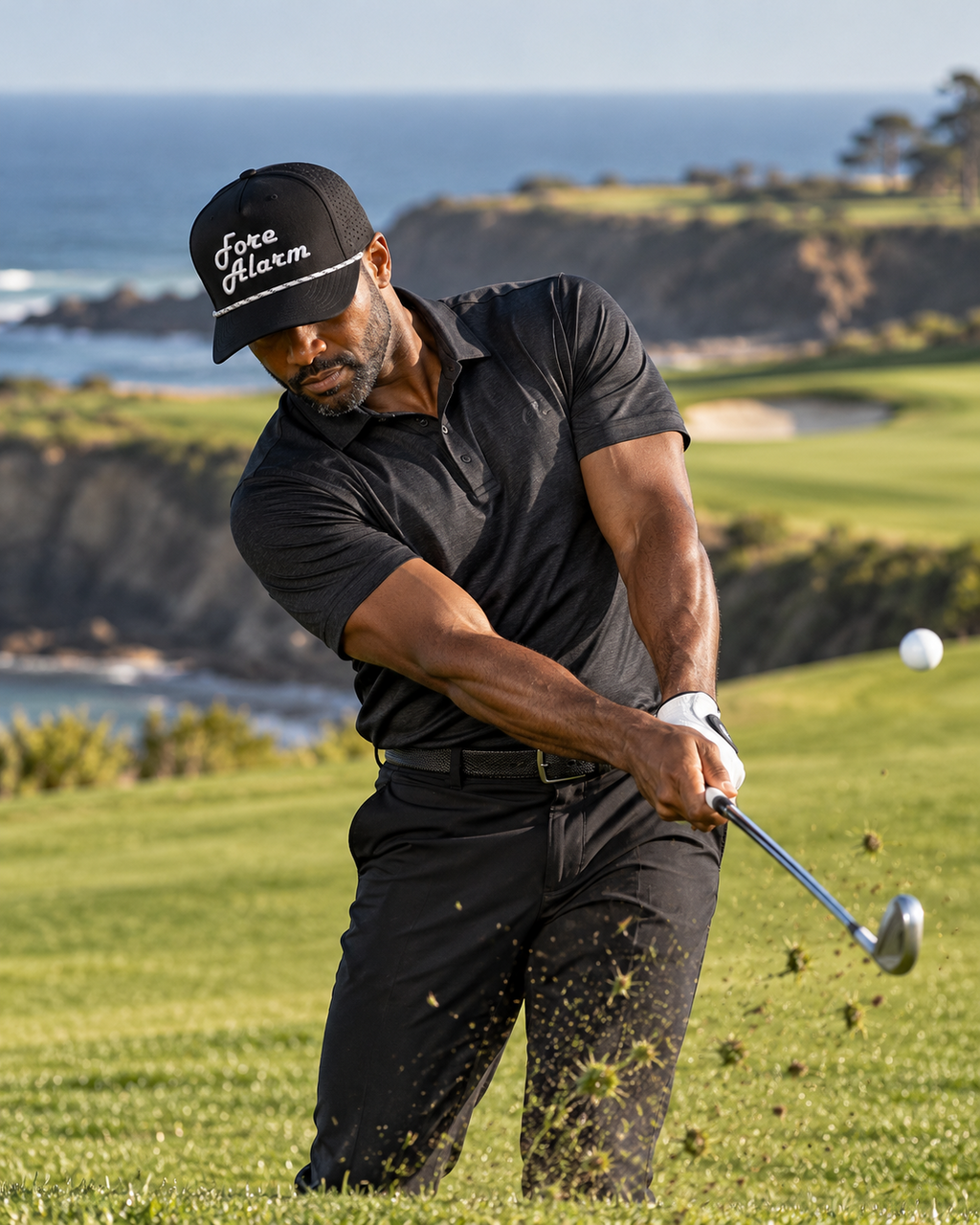 Golfer hitting an approach shot in a Fore Alarm black and white rope hat